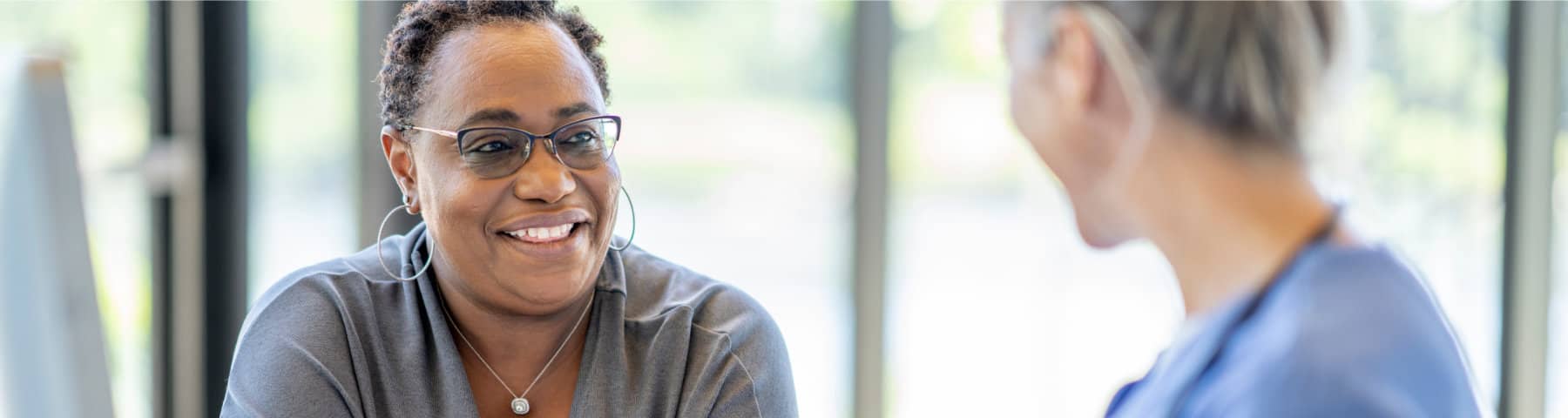 Patient speaking with a healthcare provider during a medical consultation