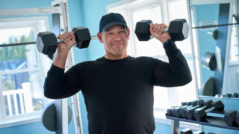Humberto Cordero lifting dumbells