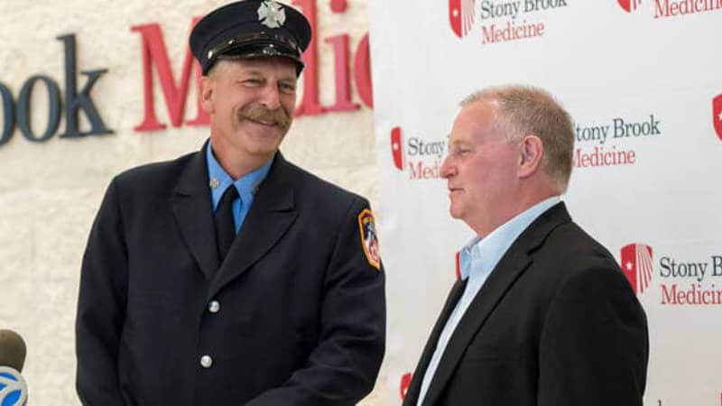 Cliff in uniform standing next to Bob Short